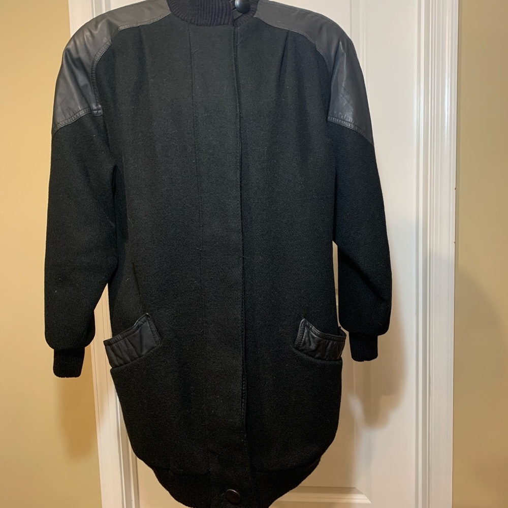 Wool coat trimmed in leather